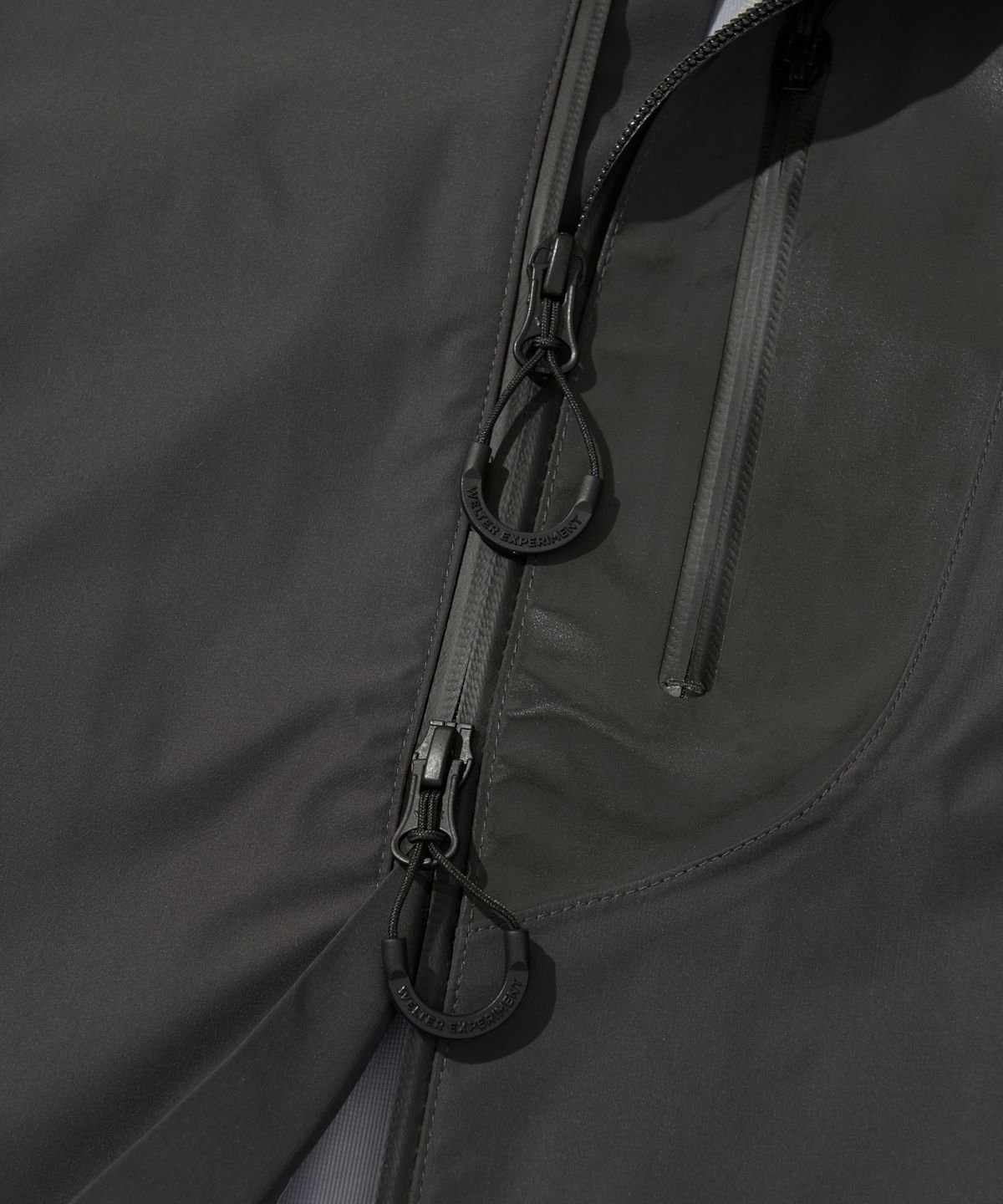 웰터 익스페리먼트(WELTER EXPERIMENT) WOL029_3LAYER NUT HOOD SHELL JACKET_Charcoal
