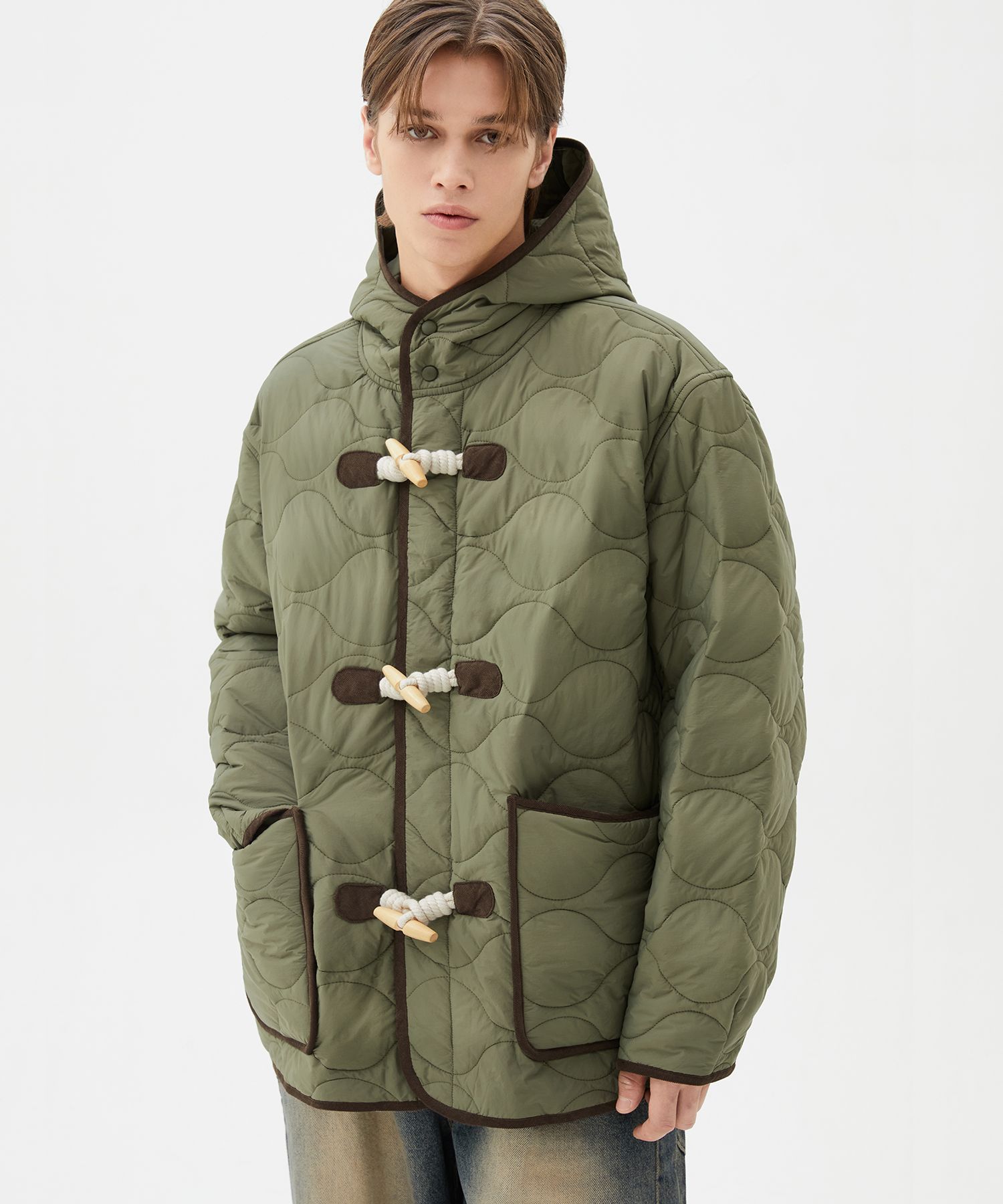MUSINSA | TRILLION Unisex Hooded Duffle Quilted Padding (KHAKI)