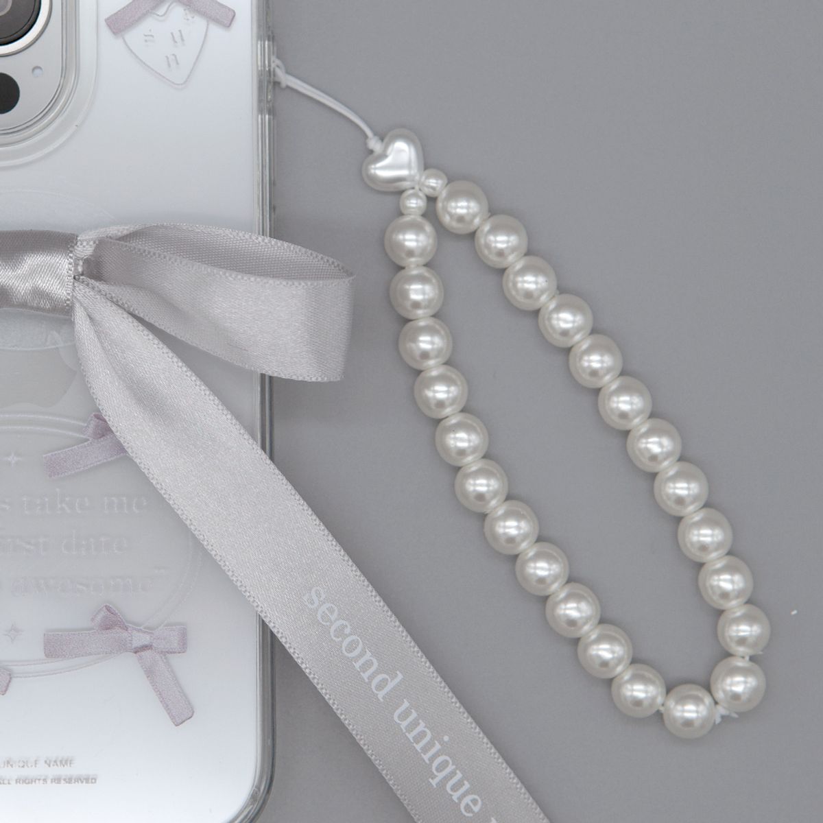 세컨드유니크네임(SECOND UNIQUE NAME) SUN CASE CLEAR BALLET RIBBON SILVER