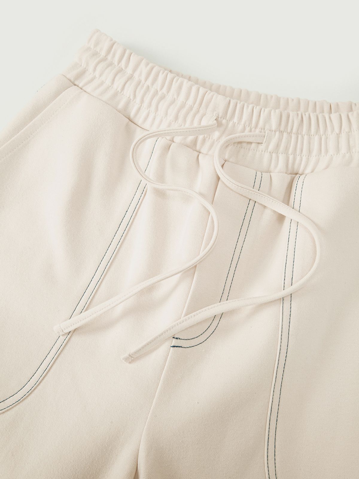 민더리(MEENDERI) ROUND POCKET JOGGER PANTS - CREAM