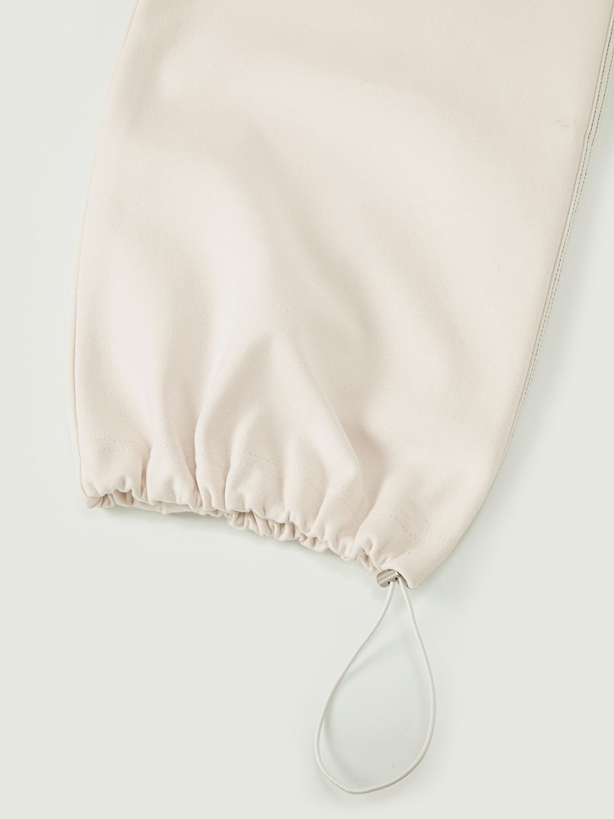 민더리(MEENDERI) ROUND POCKET JOGGER PANTS - CREAM