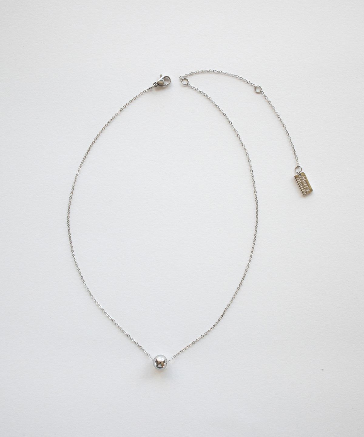 메리모티브(MERRYMOTIVE) Simple ball pendant with surgical necklace (2colors)