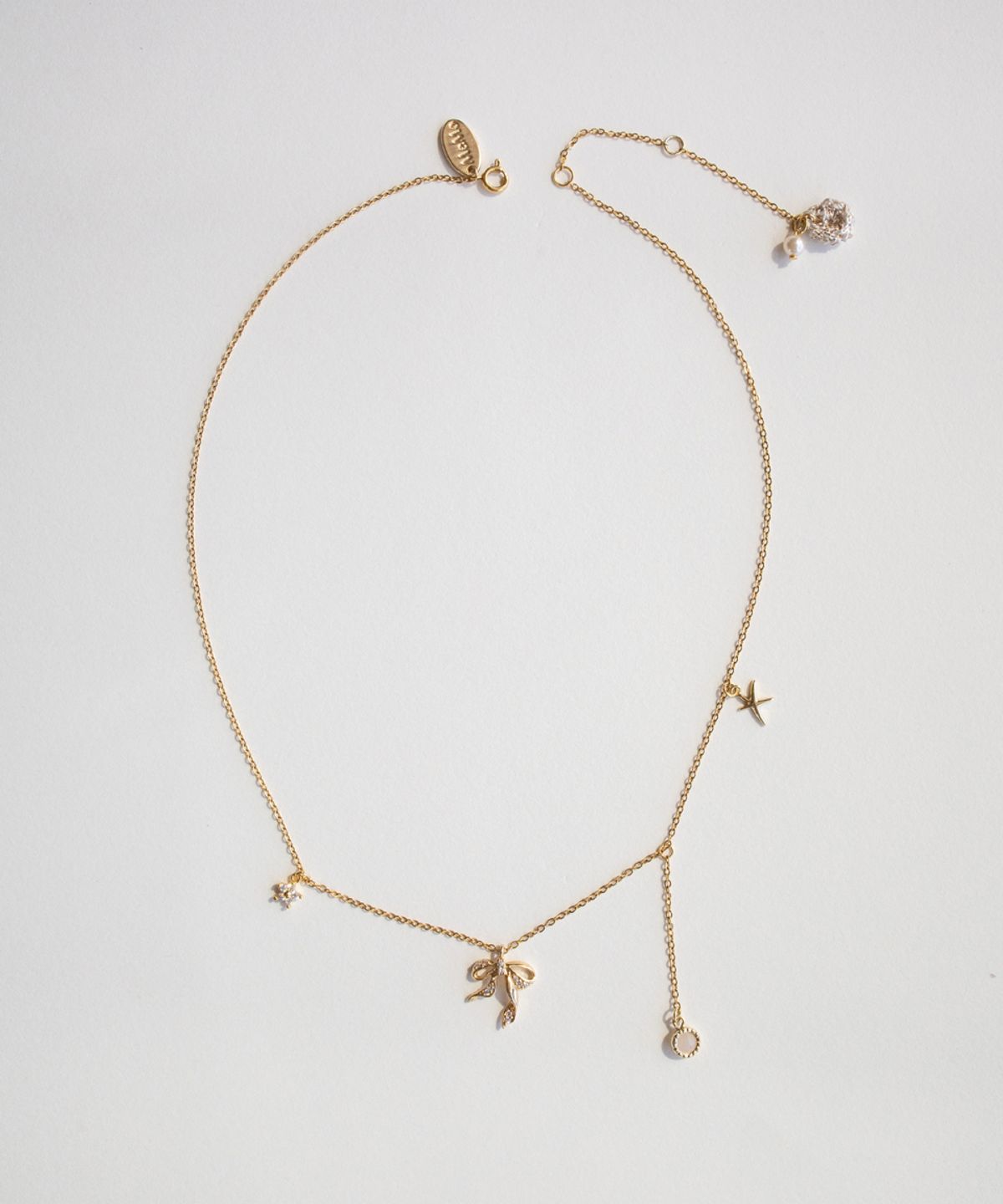 메리모티브(MERRYMOTIVE) Shining ribbon and others surgical necklace