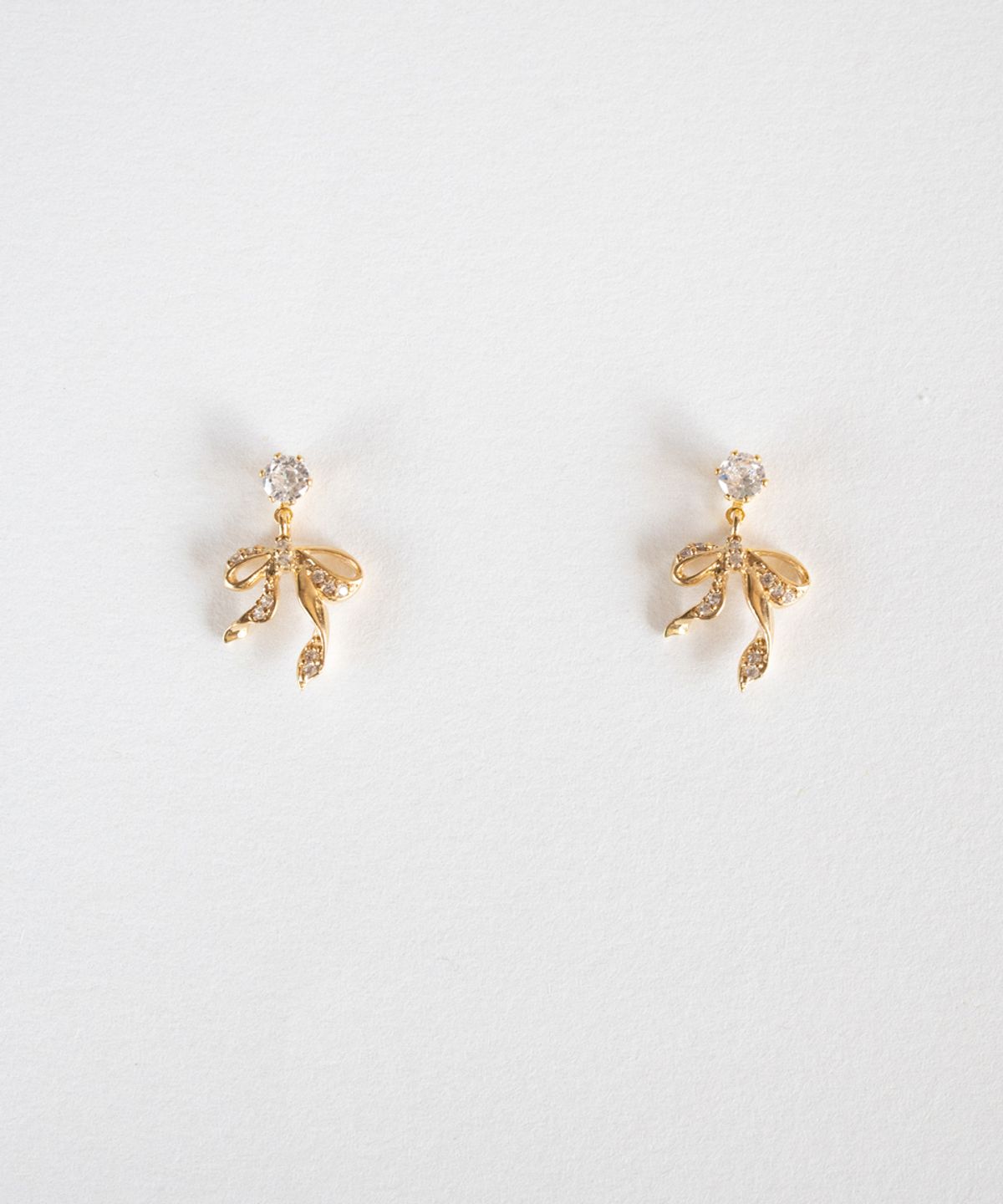 메리모티브(MERRYMOTIVE) Shining ribbon earring