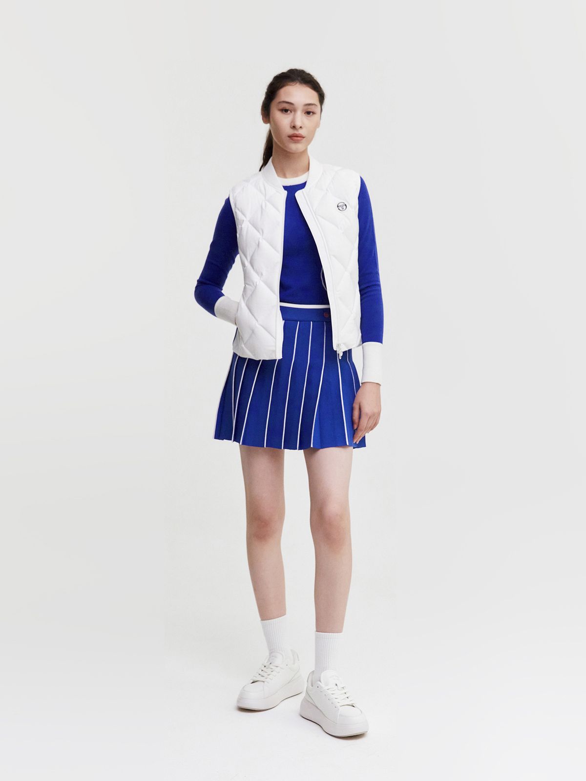 세르지오 타키니(SERGIO TACCHINI) W 리조트 니트 플리츠 스커트 (D.Blue)