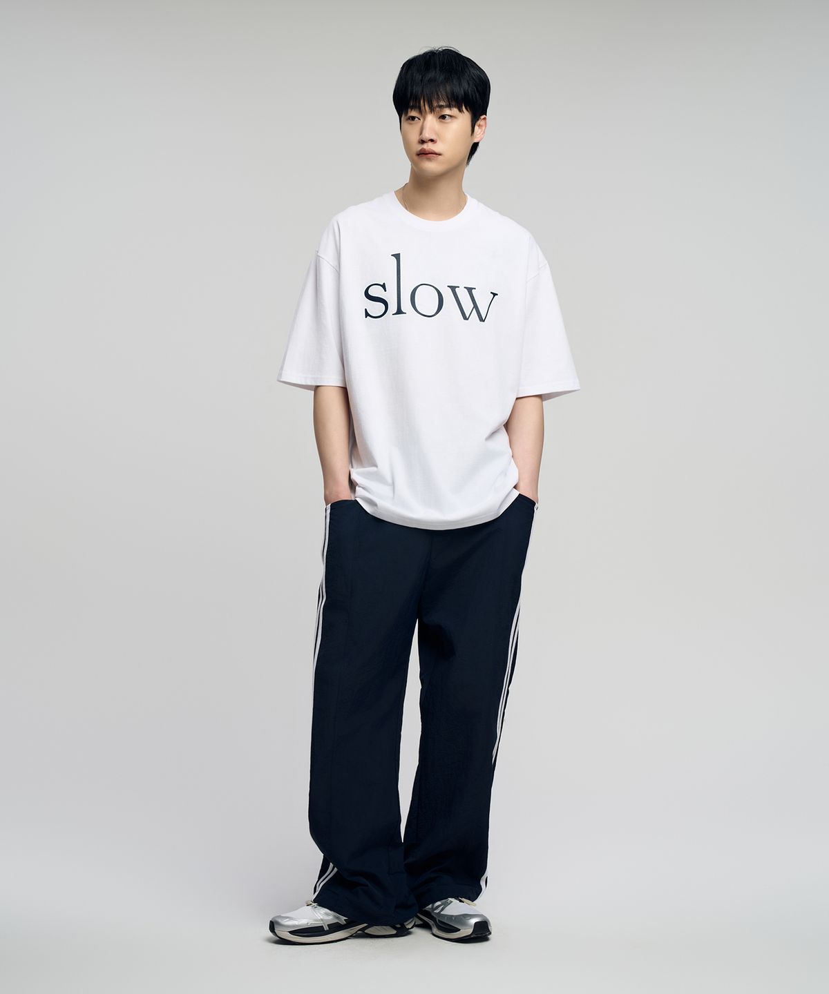 슬로우 레코드 하우스(SLOW RECORD HOUSE) 사이드 트랙 나일론 팬츠_네이비
