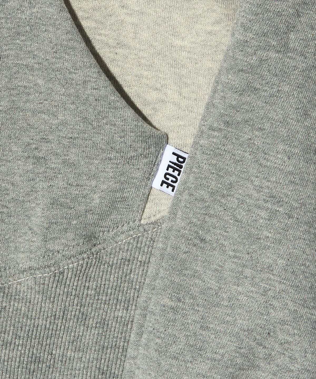 피스메이커(PIECE MAKER) EX CIRCLE HEM CROP HOODIE (GREY)