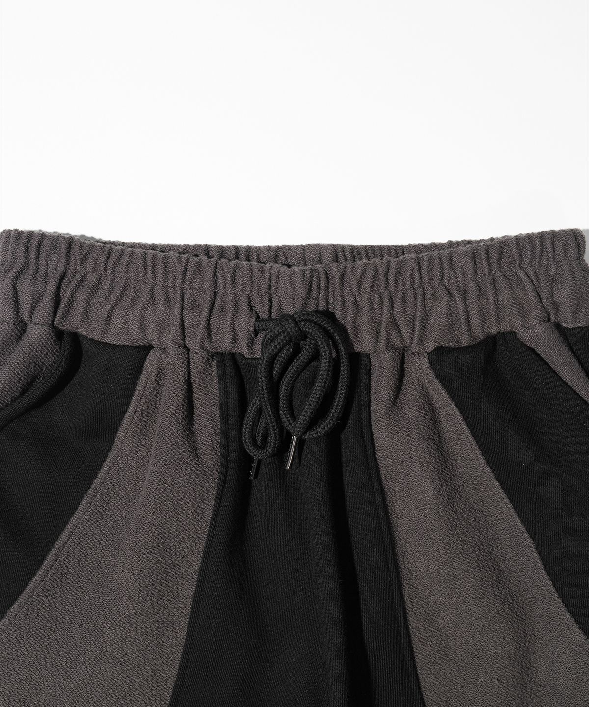 매스노운(MASSNOUN) TWIST REVERSE TRAINING PANTS MFHTP001-BK