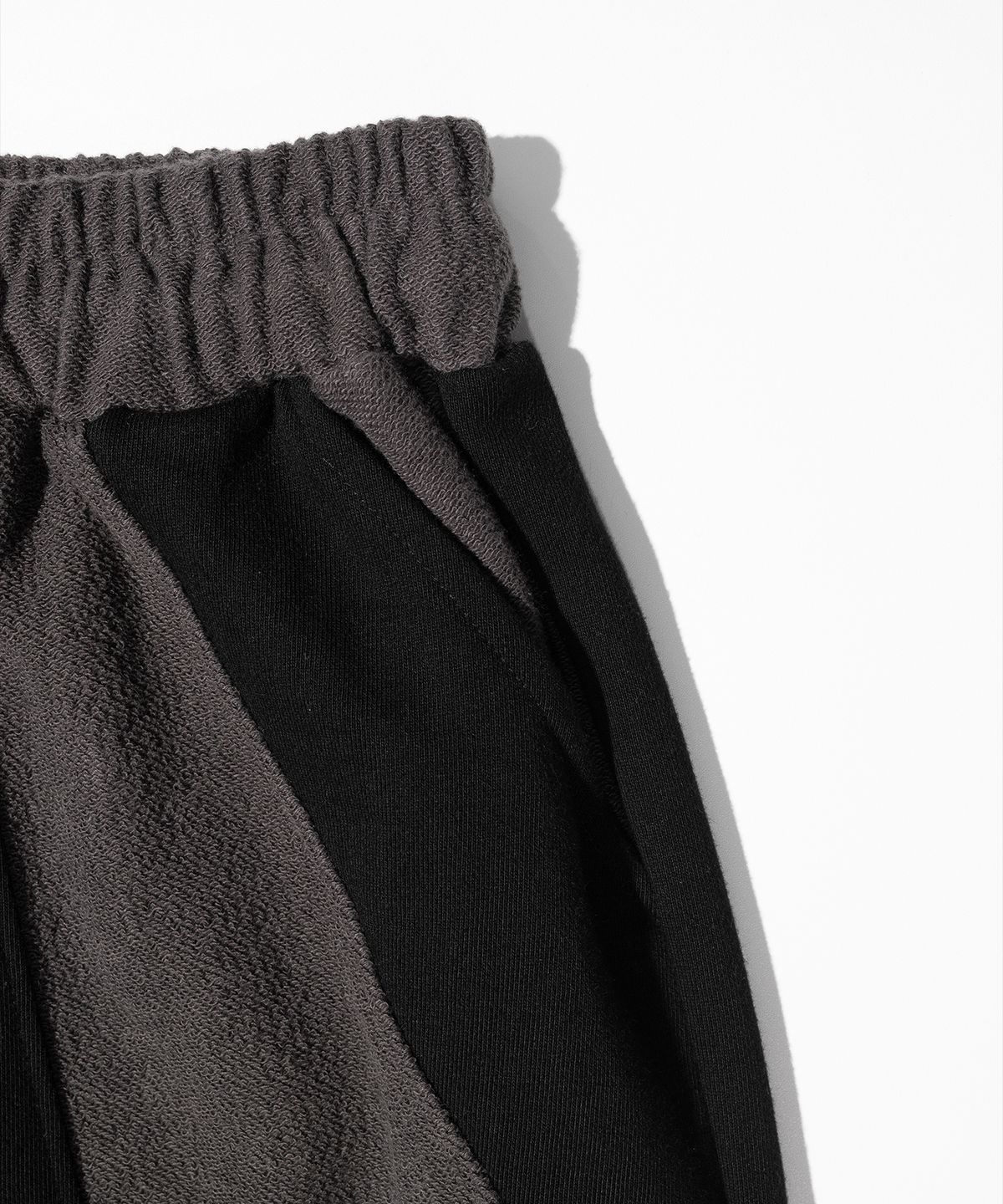 매스노운(MASSNOUN) TWIST REVERSE TRAINING PANTS MFHTP001-BK