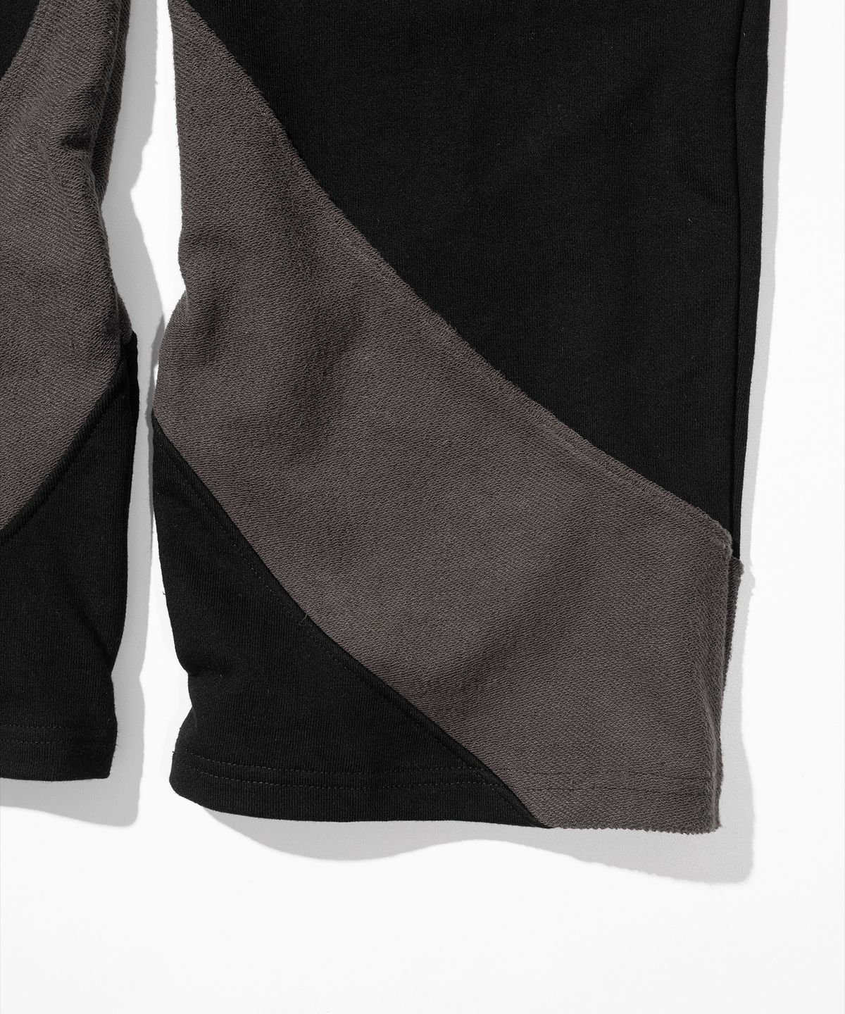 매스노운(MASSNOUN) TWIST REVERSE TRAINING PANTS MFHTP001-BK