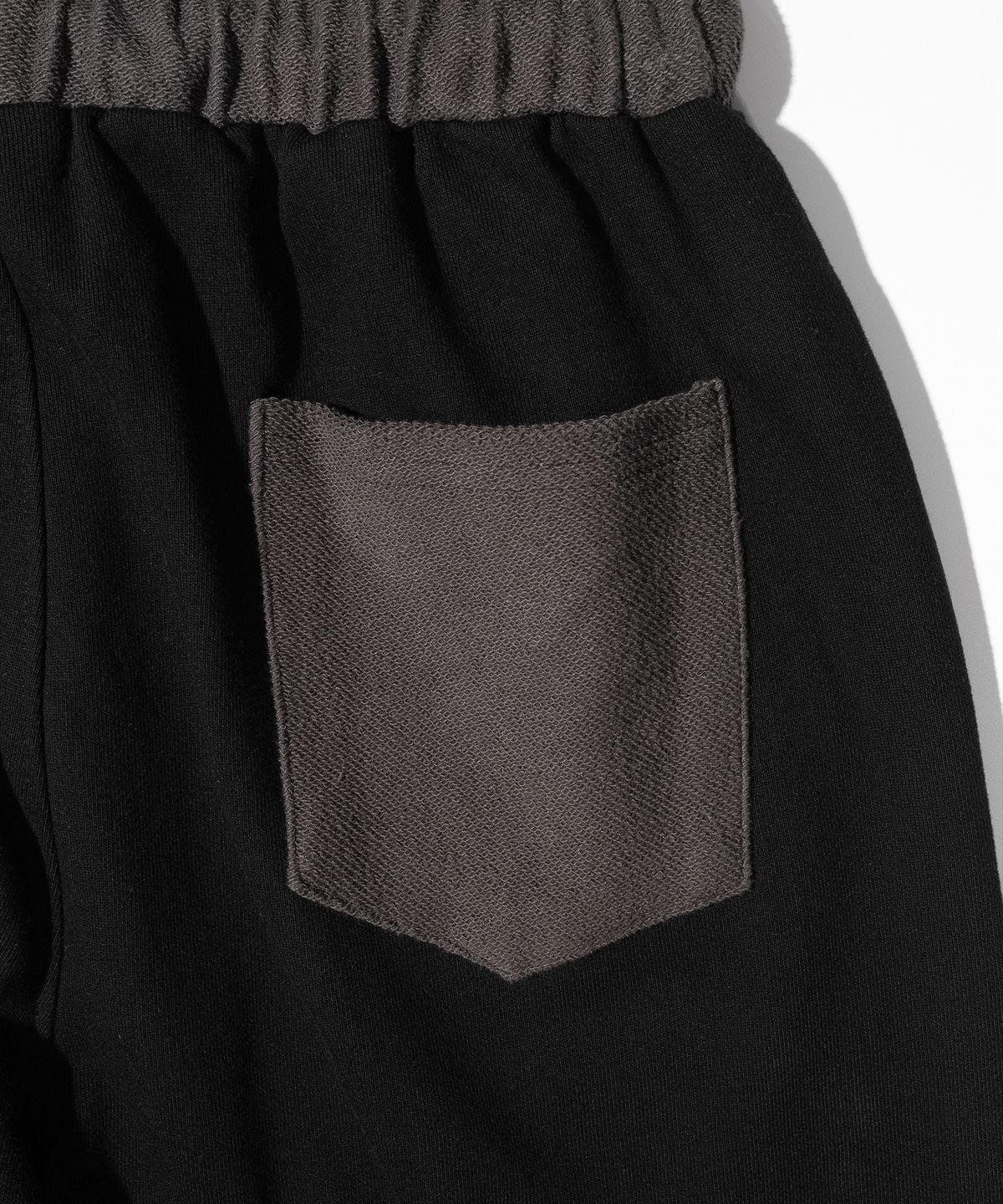 매스노운(MASSNOUN) TWIST REVERSE TRAINING PANTS MFHTP001-BK
