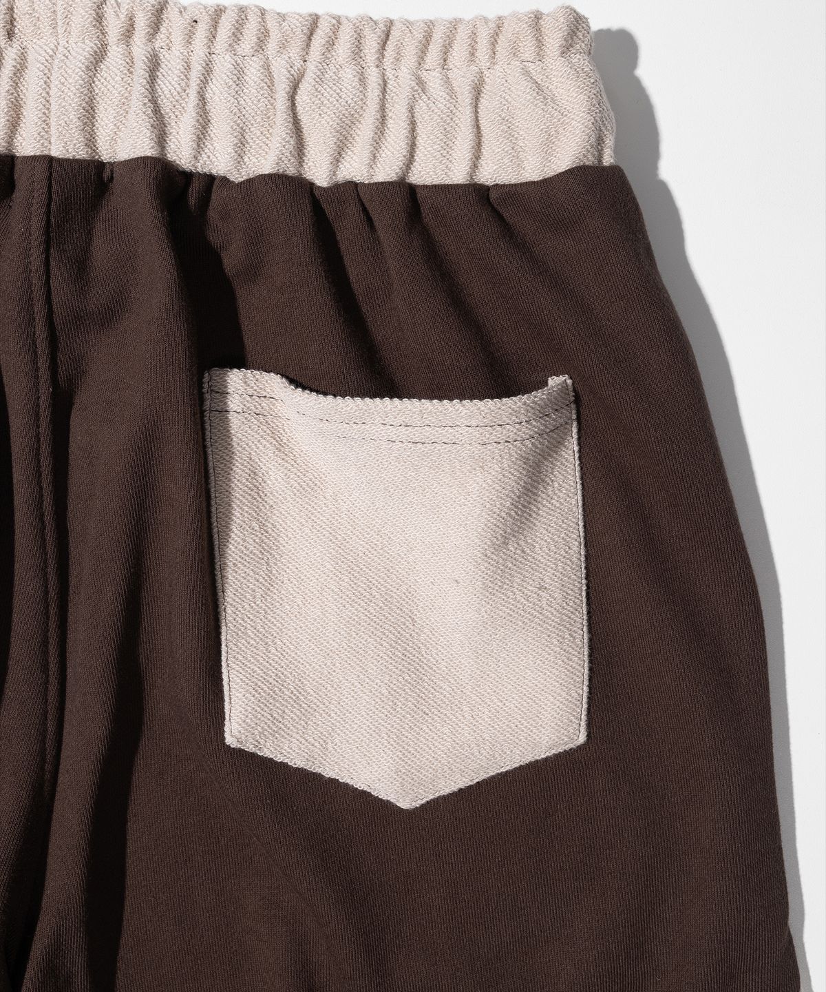 매스노운(MASSNOUN) TWIST REVERSE TRAINING PANTS MFHTP001-BR