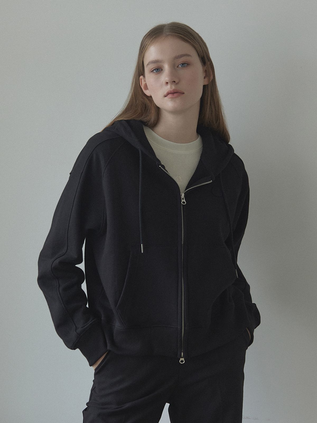 논로컬(NONLOCAL) Emblem Logo Hood Zip-Up - Black