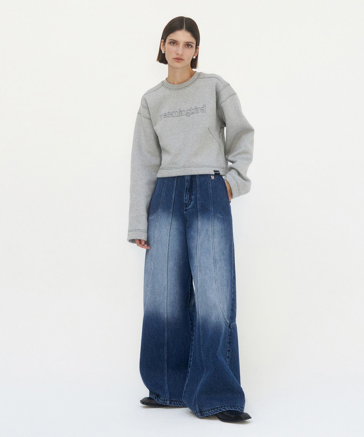 트리밍버드(TREEMINGBIRD) Curved Pocket Cut Denim Pants [ Blue ]