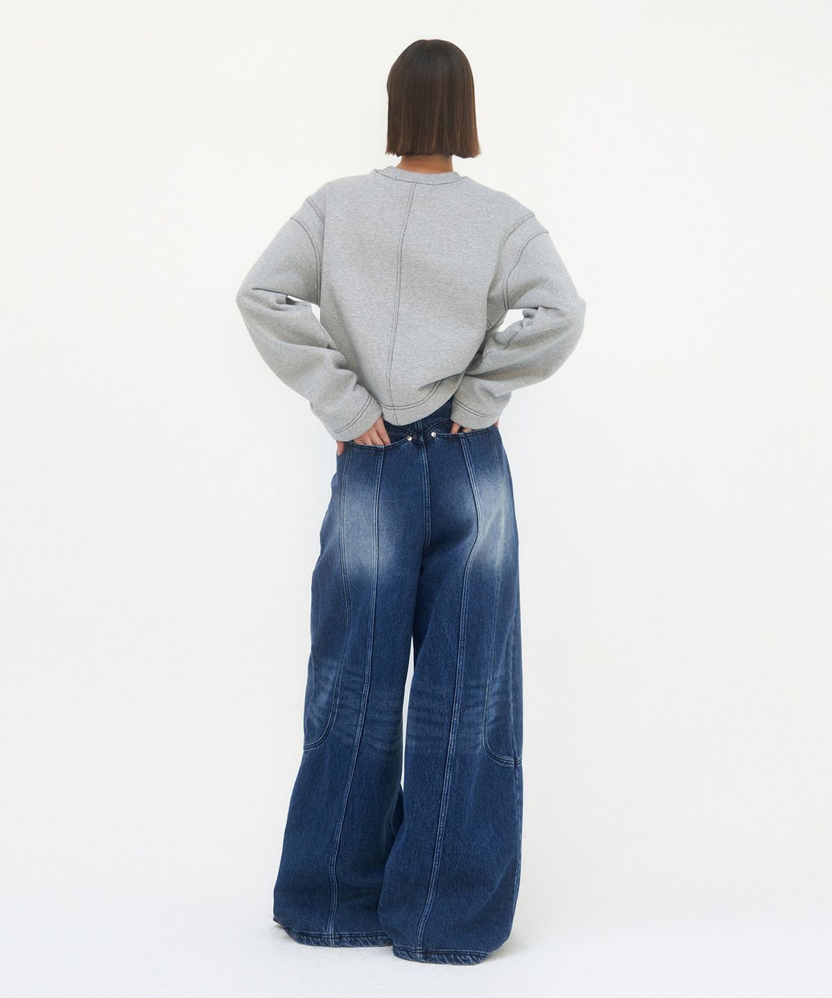 트리밍버드(TREEMINGBIRD) Curved Pocket Cut Denim Pants [ Blue ]