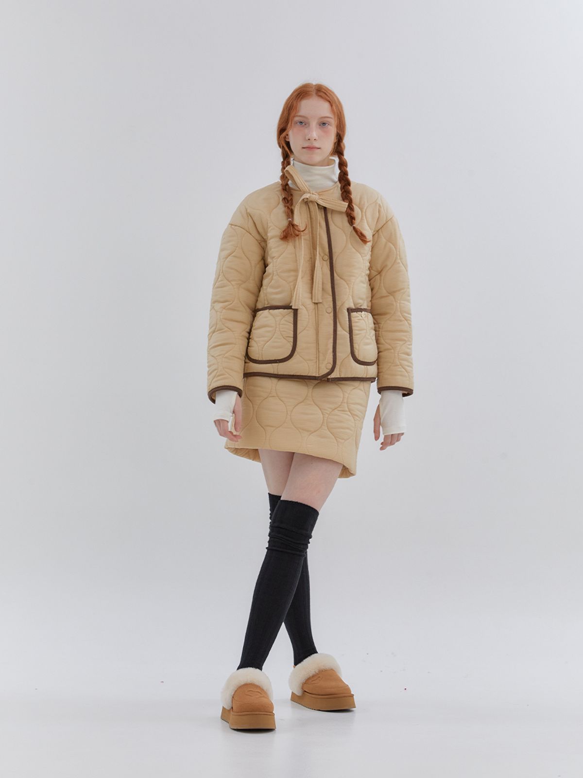 아노에틱(ANOETIC) WAVE LINE QUILTING SKIRT_BEIGE