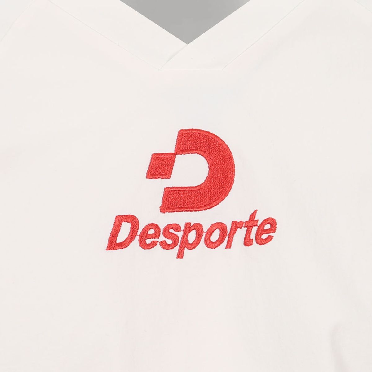데스포르치(DESPORTE) 루씨르 풋볼 트레이닝 탑 (오버핏) WHT/RED