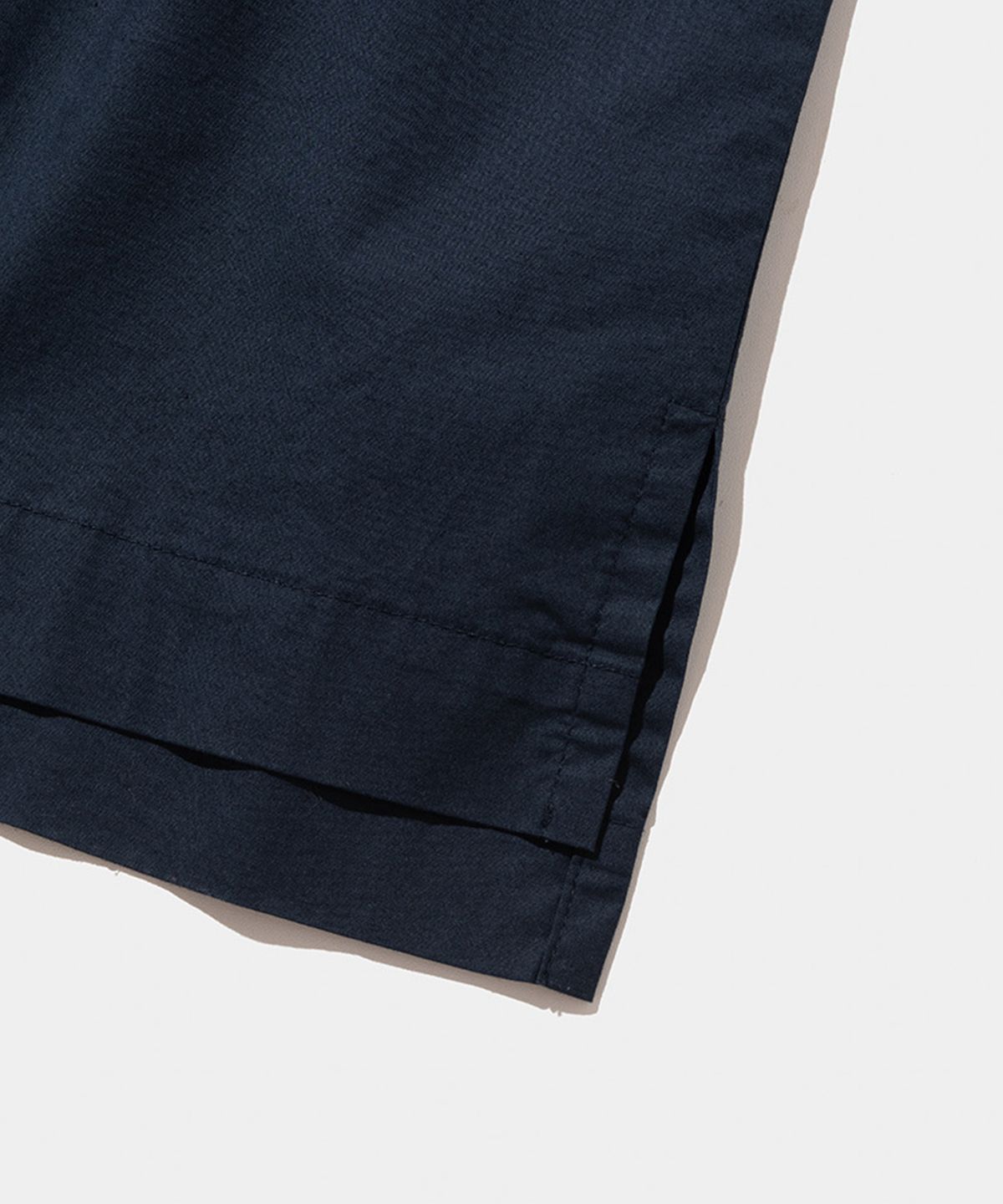 스탠드먼츠(STANDMENTS) WOVEN T-SHIRT NAVY