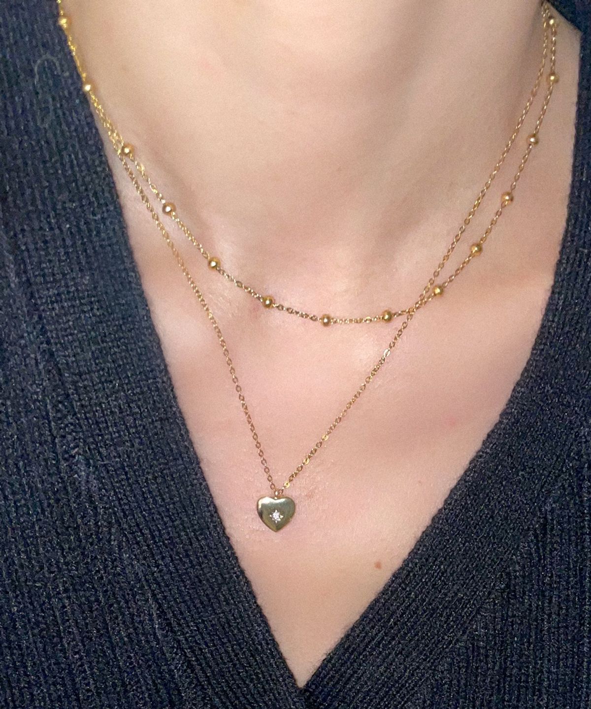 메리모티브(MERRYMOTIVE) Heart point 2 chain layered surgical gold necklace