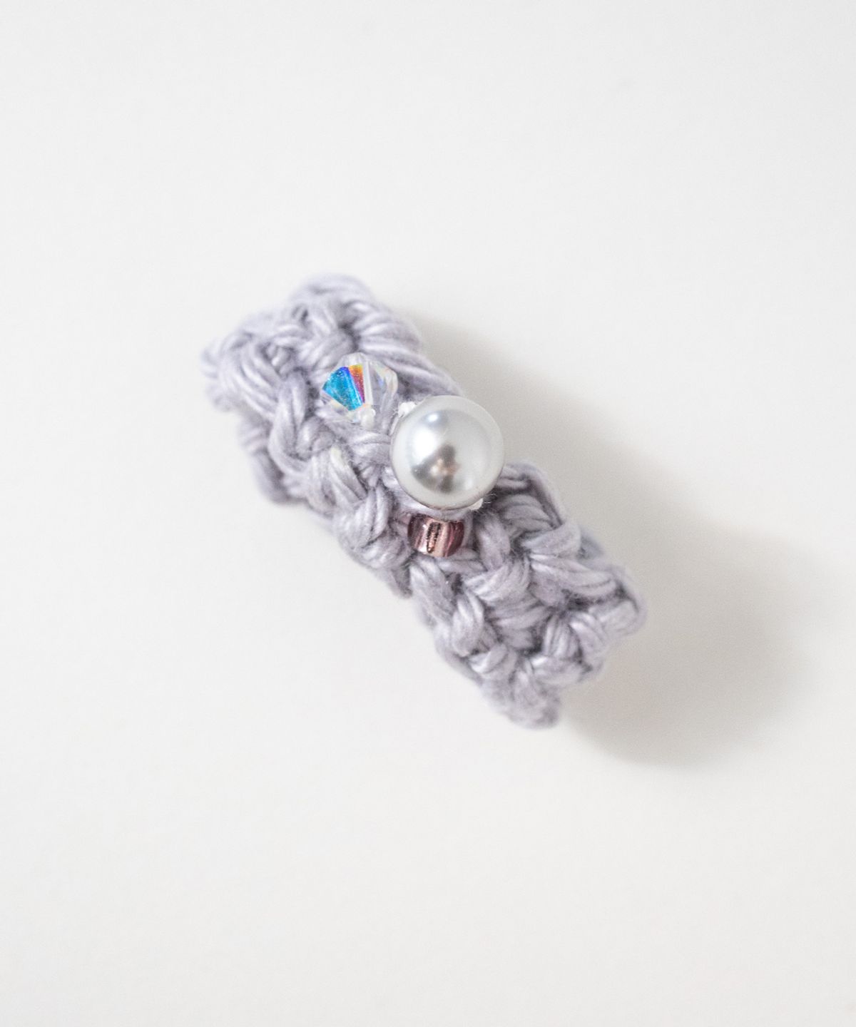 메리모티브(MERRYMOTIVE) Gem with knitted ring (Silver)