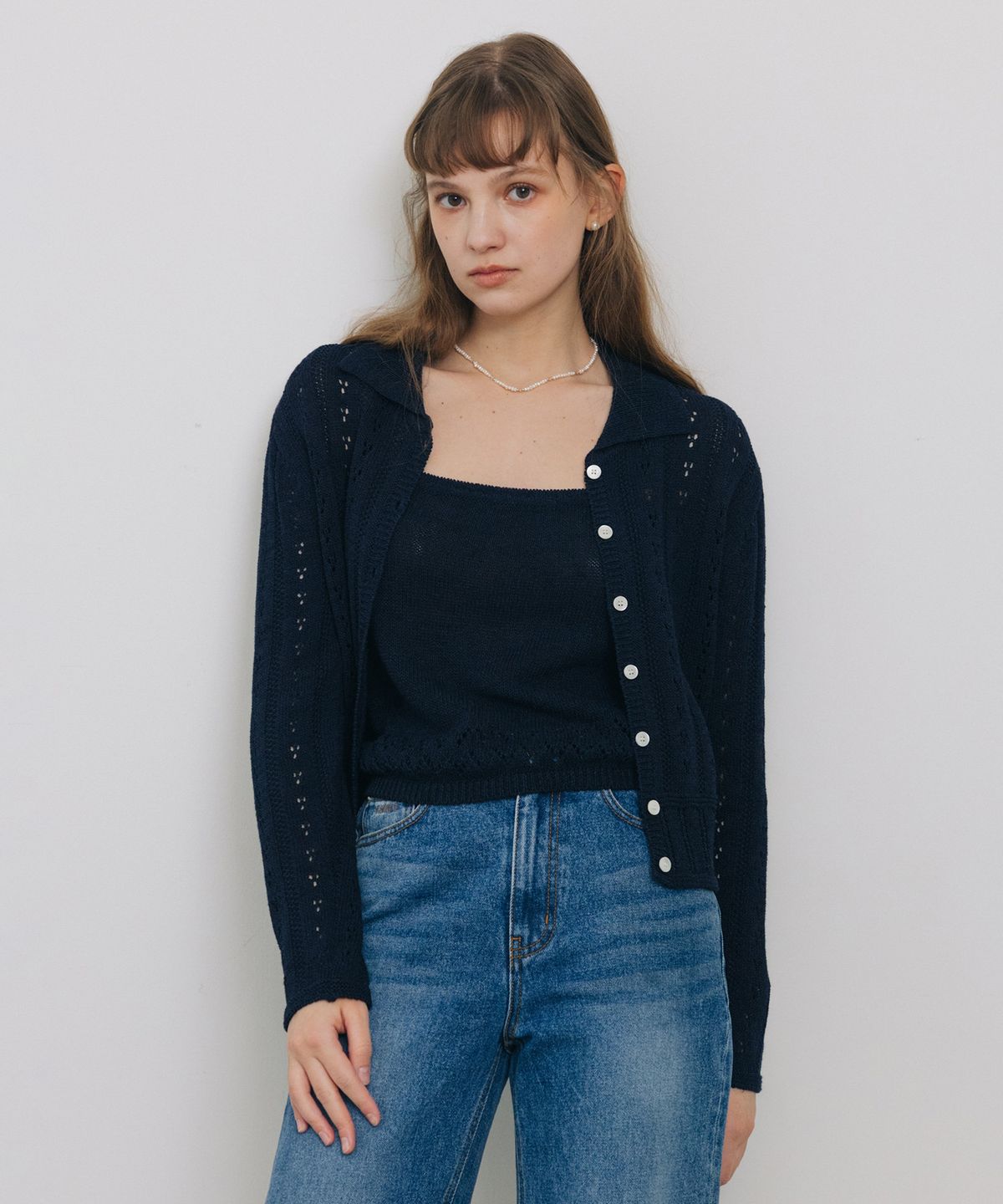 튜드먼트(TTUDEMENT) PUNCHING SLEEVELESS KNIT TOP NAVY