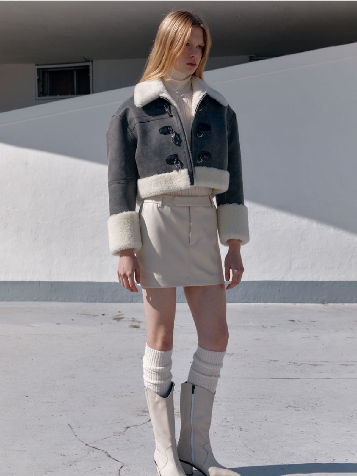 뮤제(MUSEE) RAMS Faux Leather Mini Skirt-Ivory