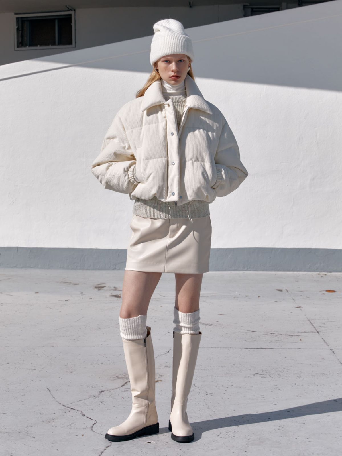 뮤제(MUSEE) RAMS Faux Leather Mini Skirt-Ivory