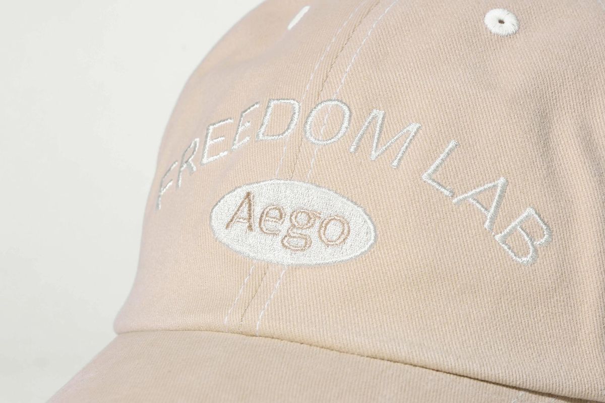 이고프리덤랩(AEGO FREEDOM LAB) 시그니처 로고 캡_아이보리