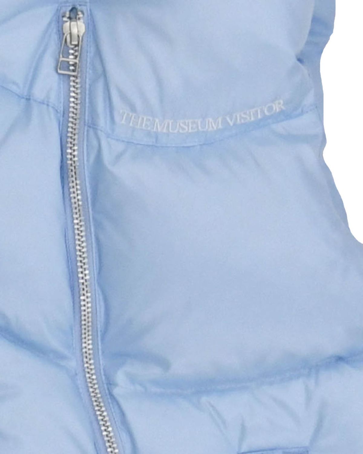 더뮤지엄비지터(THEMUSEUMVISITOR) CURVED ZIPPER PUFFER DOWN VEST (SKY BLUE)
