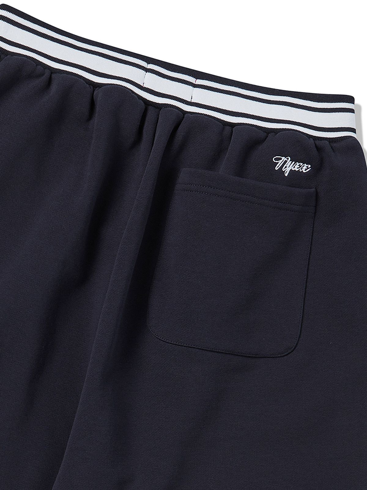 엔와이엑스엑스(NYXX) EMBLEM HALF PANTS NAVY