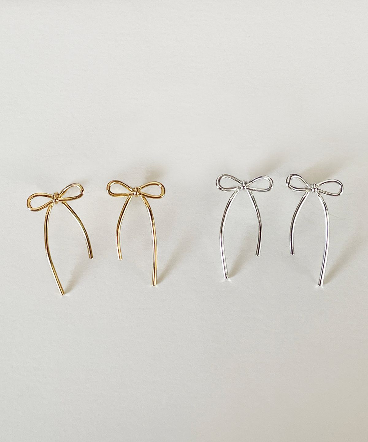 엘리오나(ELYONA) Bow Drop Earrings (gold)