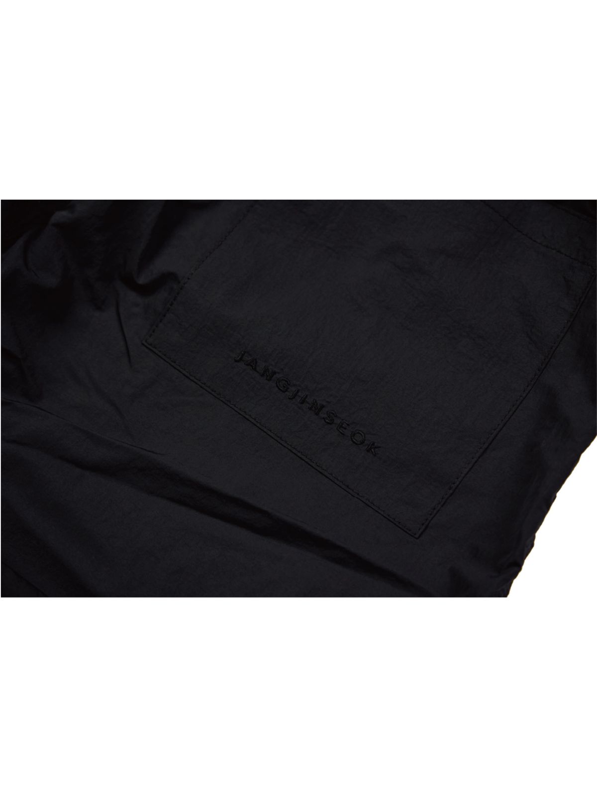 장진석(JANGJINSEOK) 나일론 셔링 팬츠 (BLACK)