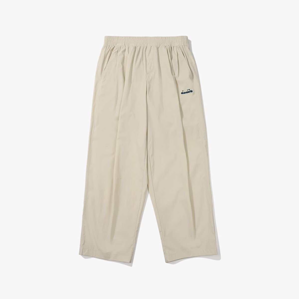 디아도라(diadora) 컴피 테이퍼드 팬츠 BEIGE