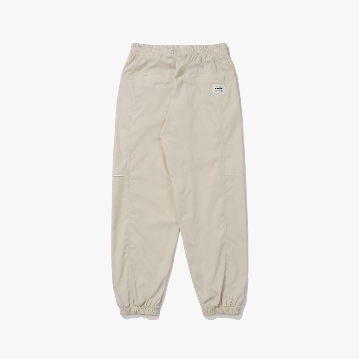 디아도라(diadora) 컴피 조거 우븐 팬츠 BEIGE