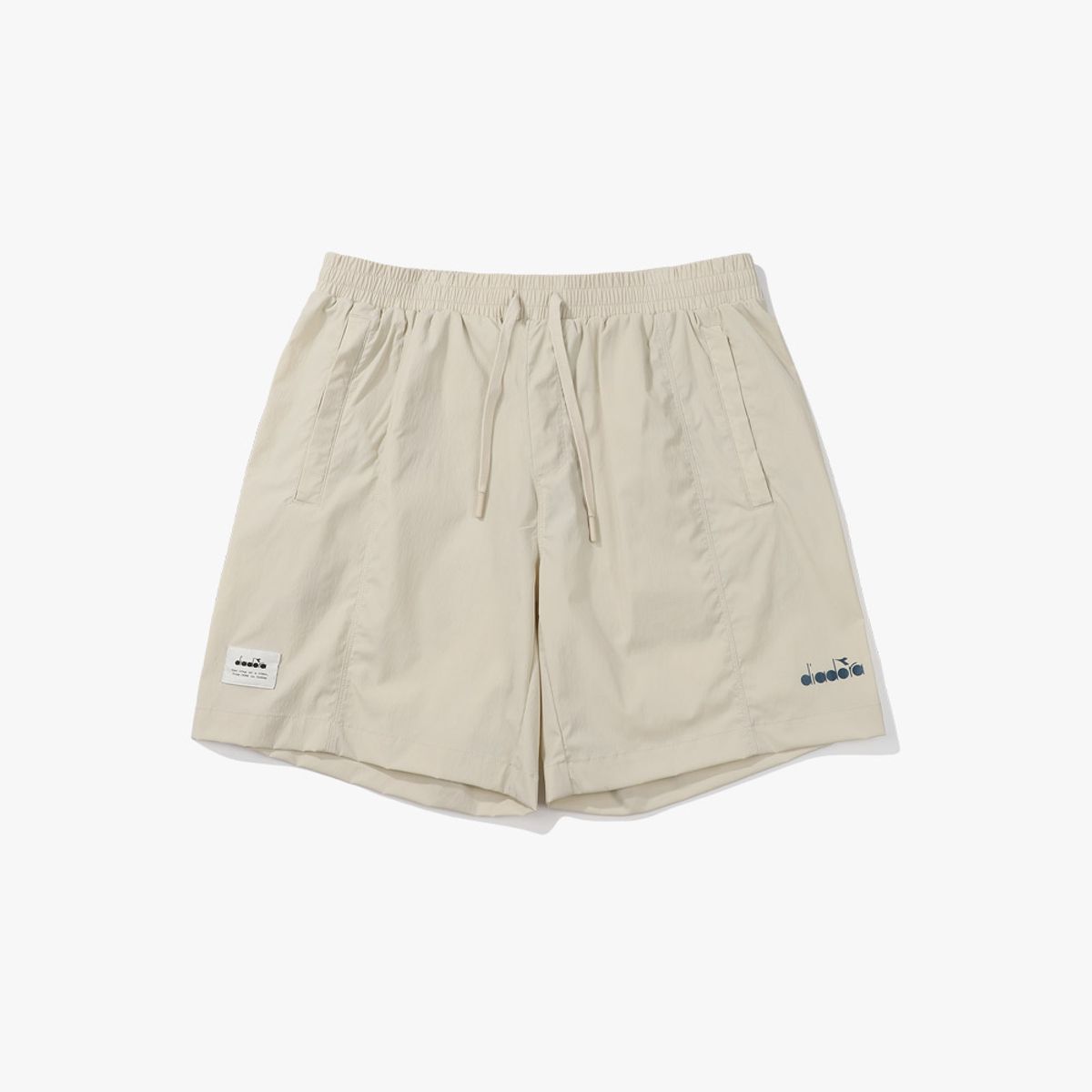 디아도라(diadora) 컴피 우븐 하프팬츠 BEIGE