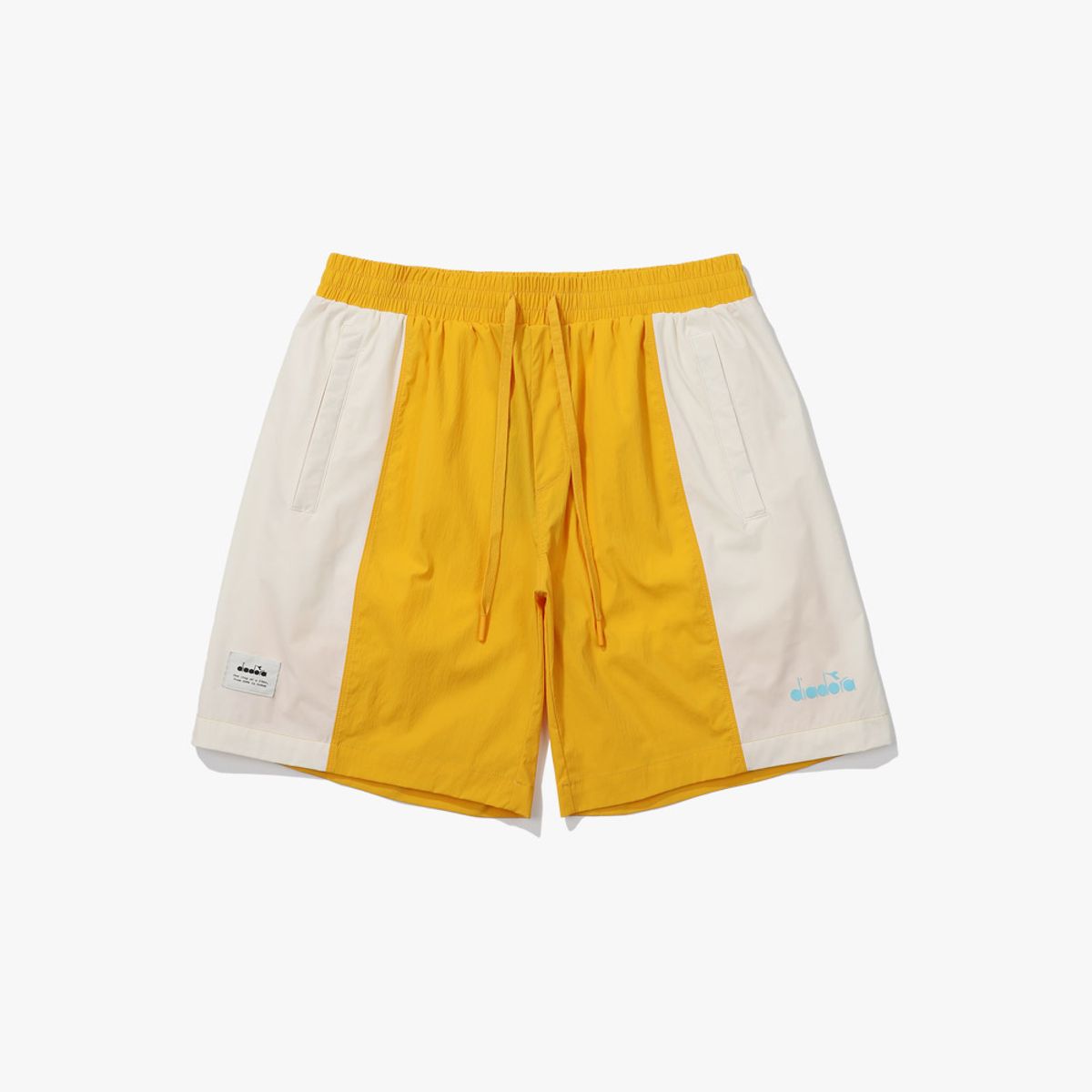 디아도라(diadora) 컴피 우븐 하프팬츠 YELLOW