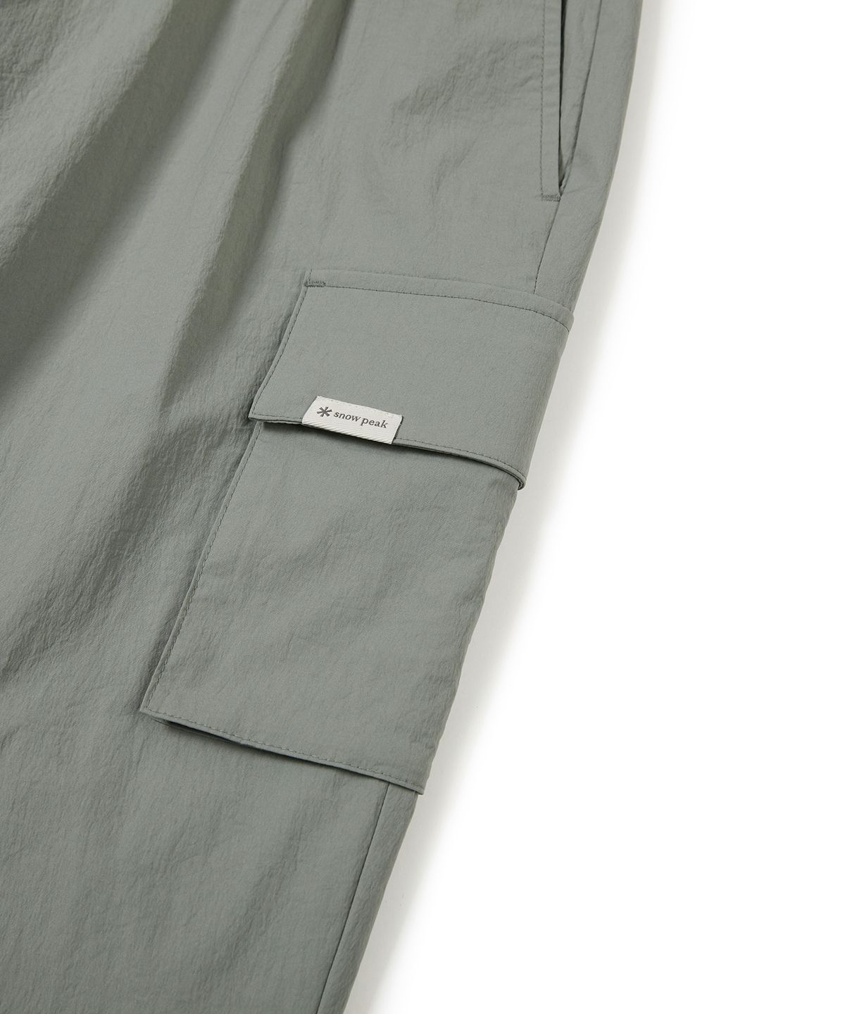 스노우피크 어패럴(SNOWPEAK APPAREL) 루트 카고 조거 팬츠 Light Khaki (S24MMRPT60)