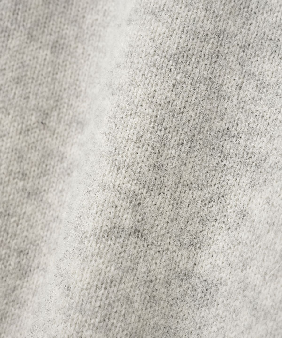 니티드(KNITTED) 쉐기독 울 100 라운드 가디건 MELANGE GREY