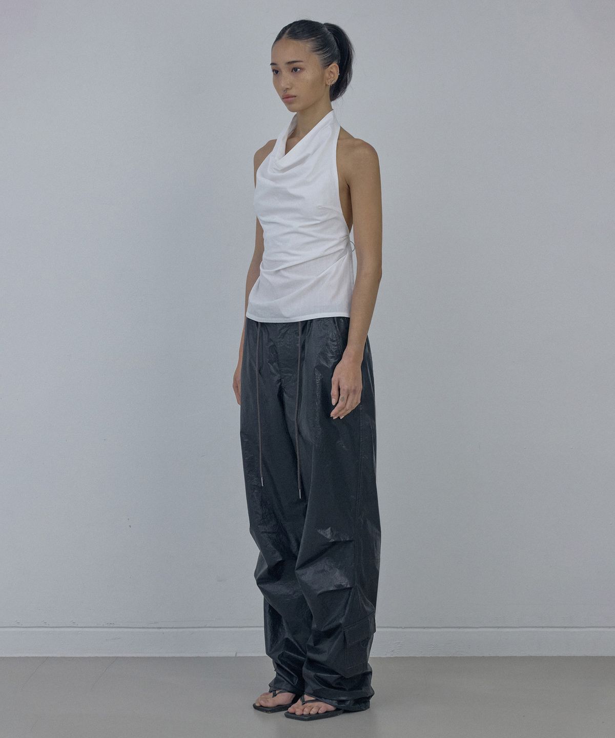스컬프터(SCULPTOR) Glossy Parachute Pants Black