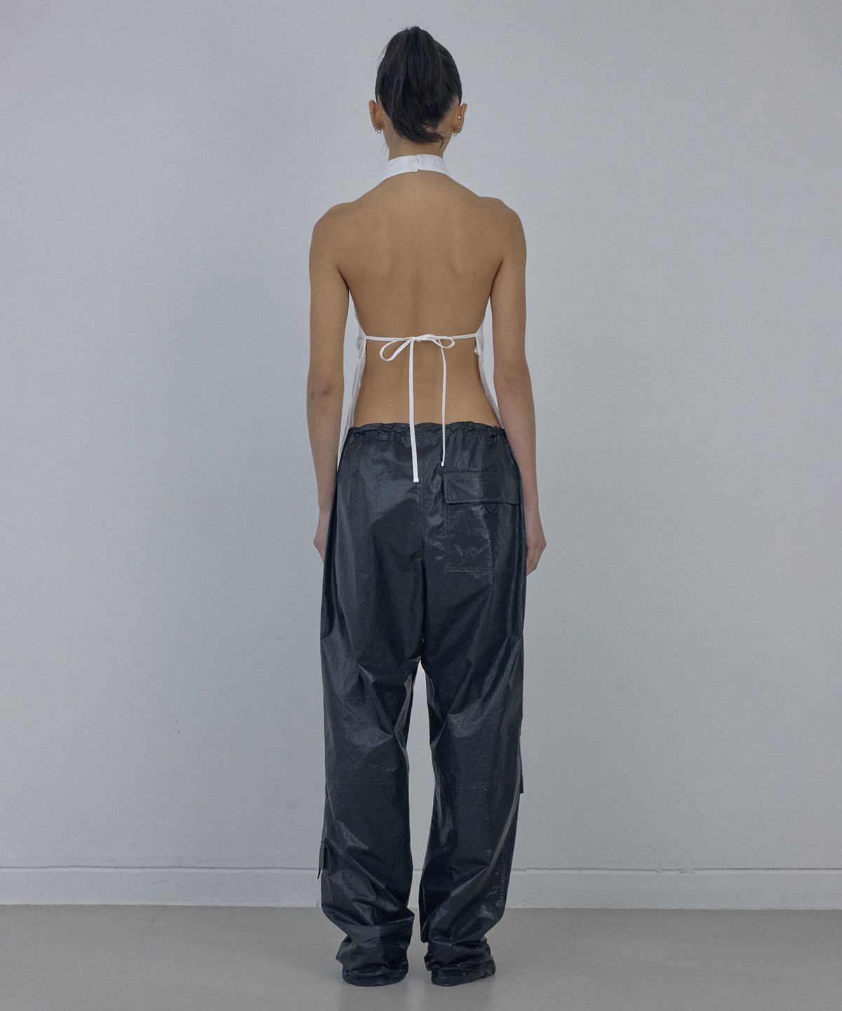 스컬프터(SCULPTOR) Glossy Parachute Pants Black