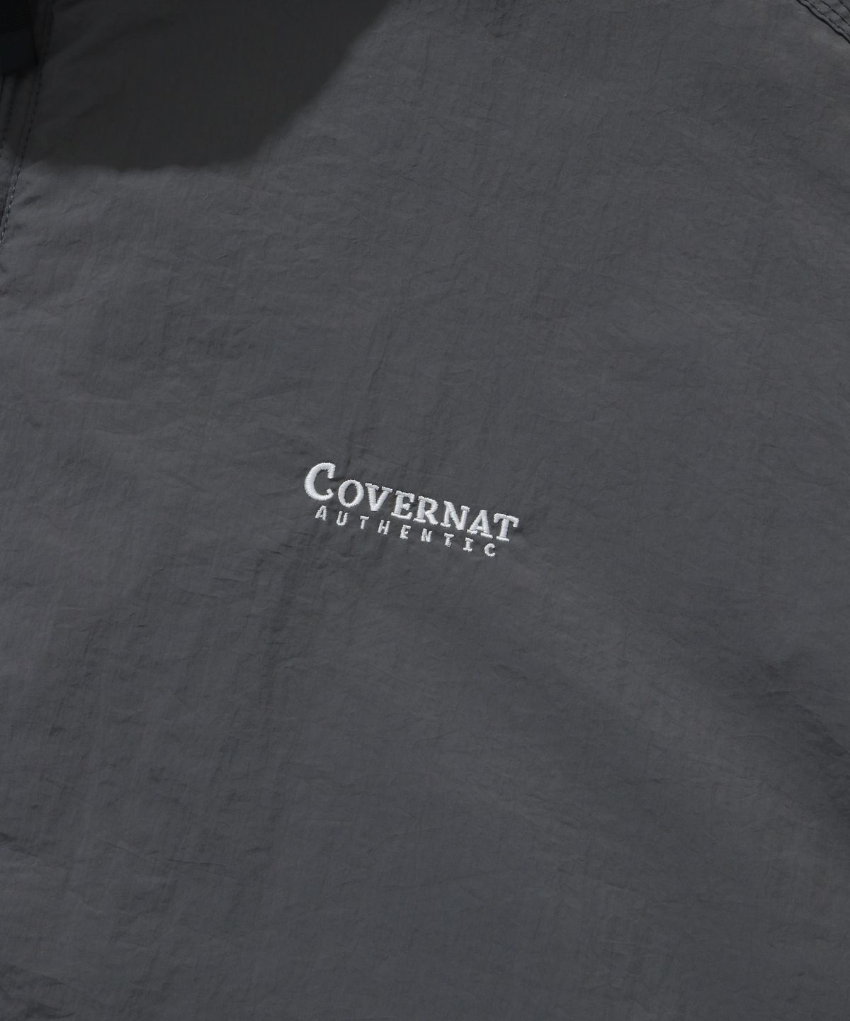 커버낫(COVERNAT) 컴피 나일론 트랙 자켓 차콜
