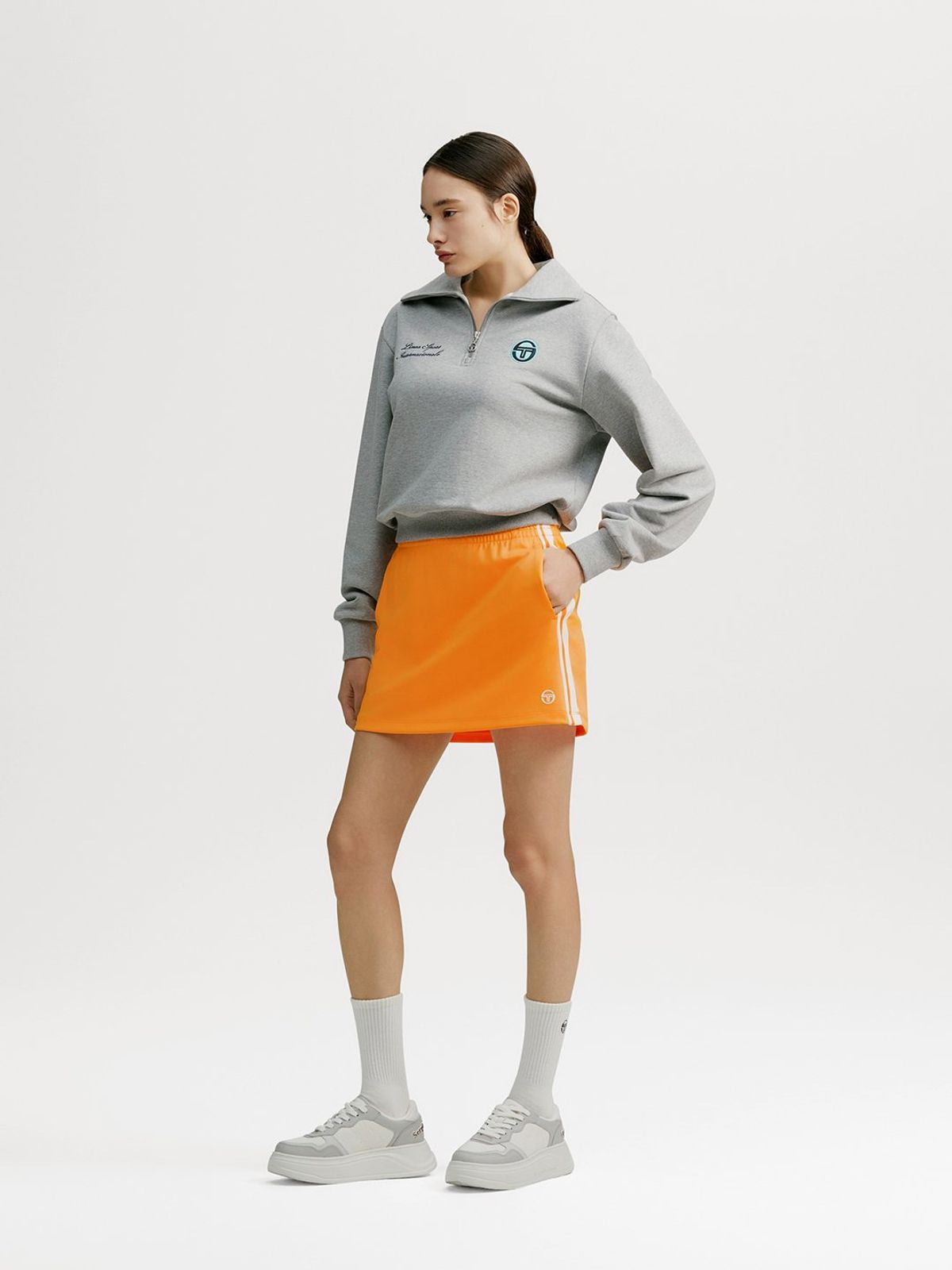 세르지오 타키니(SERGIO TACCHINI) W 고트 다마린도 트랙 스커트 (Orange)