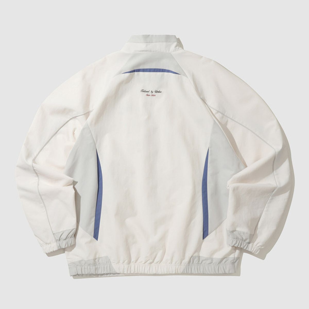 엄브로(UMBRO) HBL CELEB 스탠넥 바람막이 웜업 자켓 스위트콘(UP121CJK24)