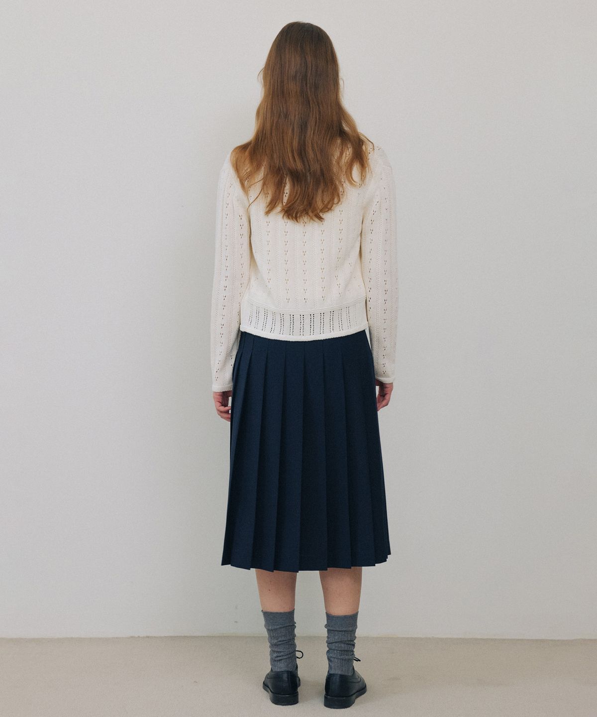 튜드먼트(TTUDEMENT) PLEATED MIDI SKIRT NAVY