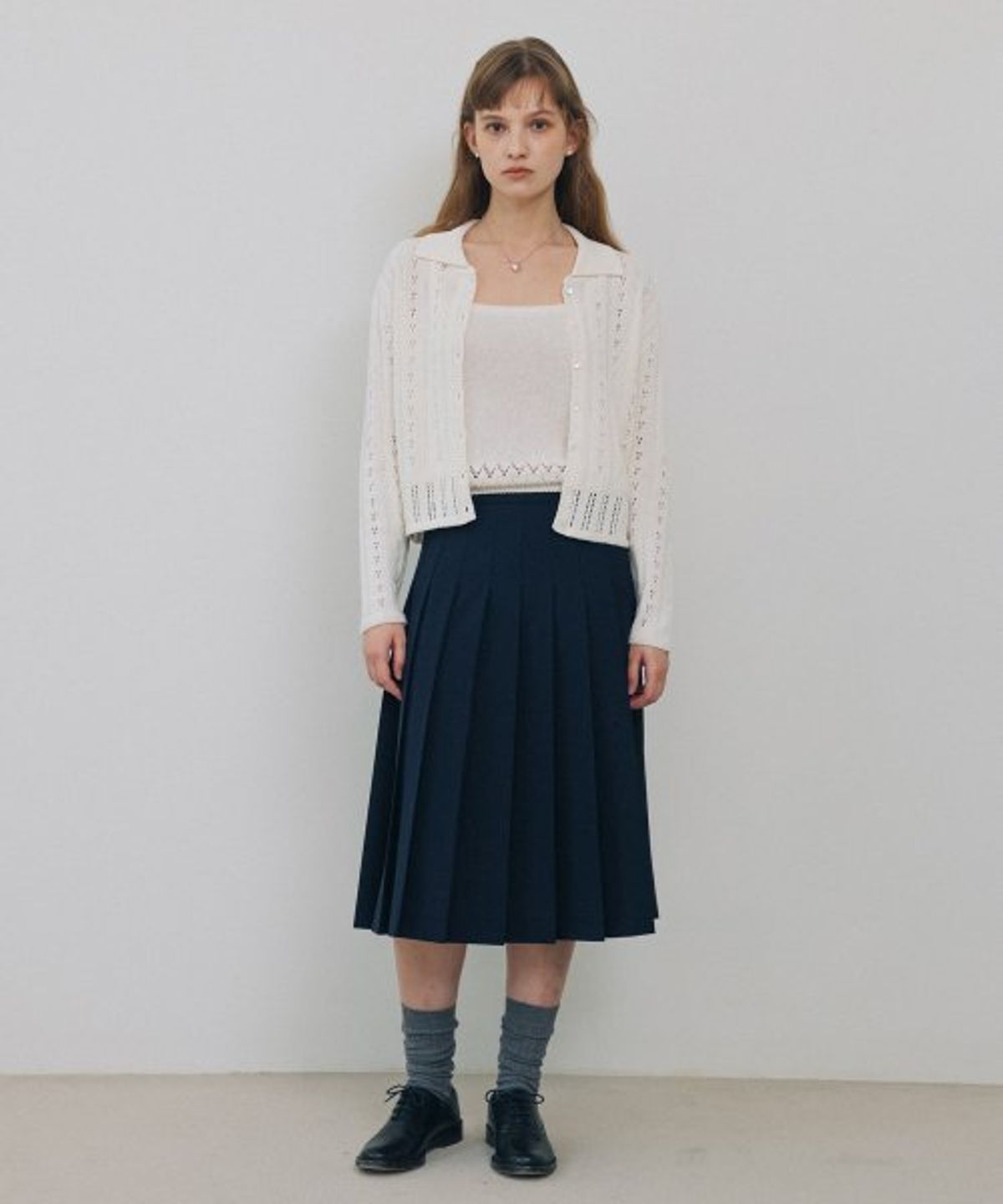 튜드먼트(TTUDEMENT) PLEATED MIDI SKIRT NAVY