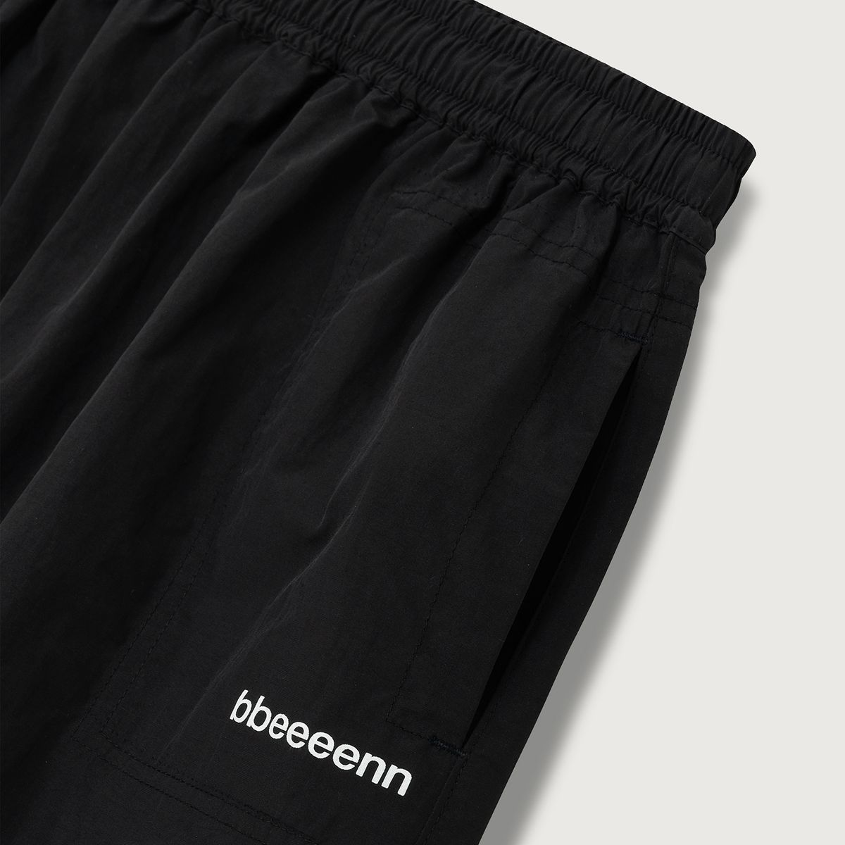 벤(BBEEEENN) 테크니컬 패브릭 스커트_블랙