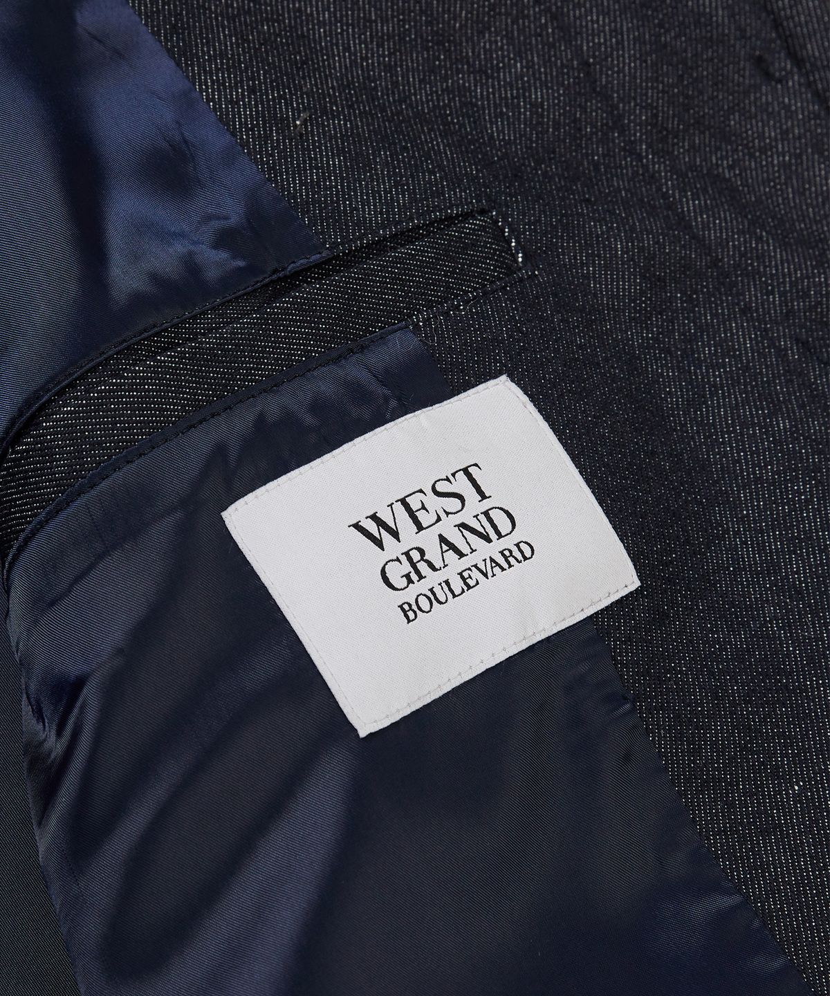 웨스트 그랜드 블러바드(WEST GRAND BOULEVARD) 히든 버튼 소프트 코튼 트러커 자켓 INDIGO DENIM