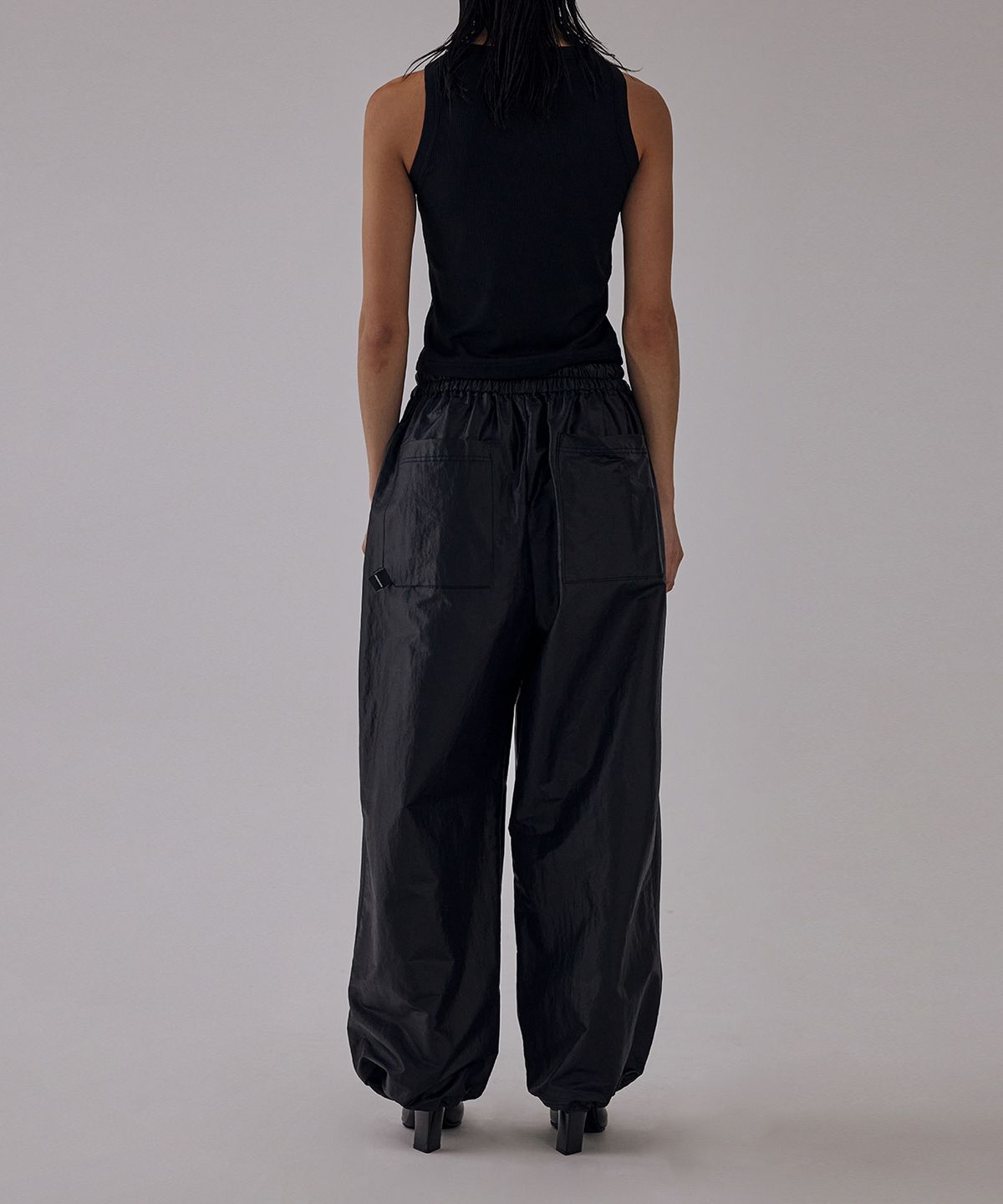 트리밍버드(TREEMINGBIRD) Glow Nylon Jogger Pants [ Black ]