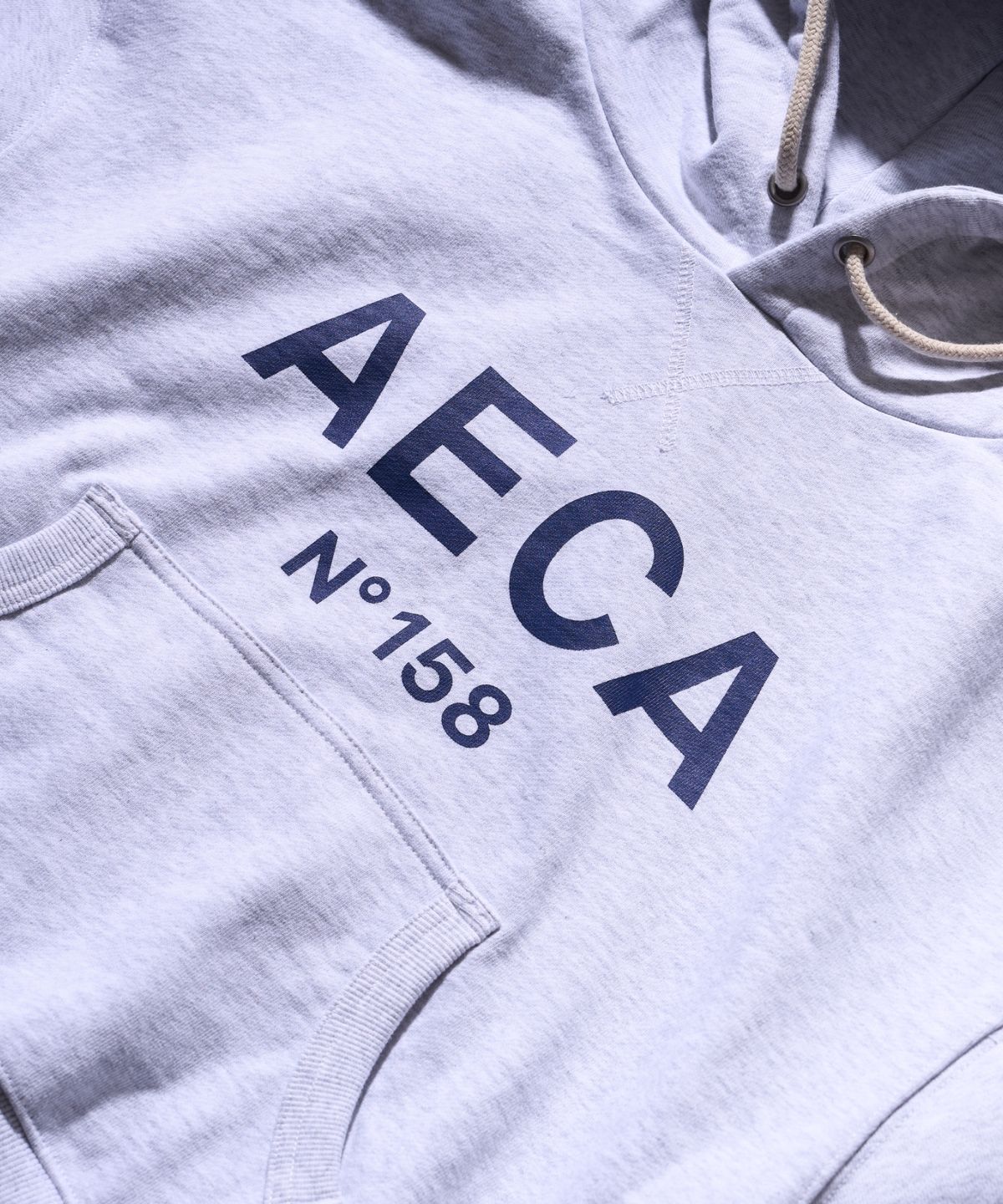 에이카화이트(AECA) BIG LOGO CROP HOODIE-LIGHT GREY/NAVY