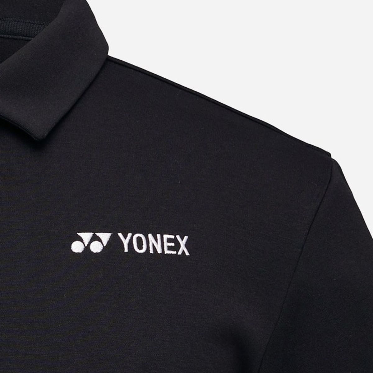 요넥스(YONEX) 241TS061U 블랙 공용 오버핏 로고 포인트 카라 반팔 티셔츠